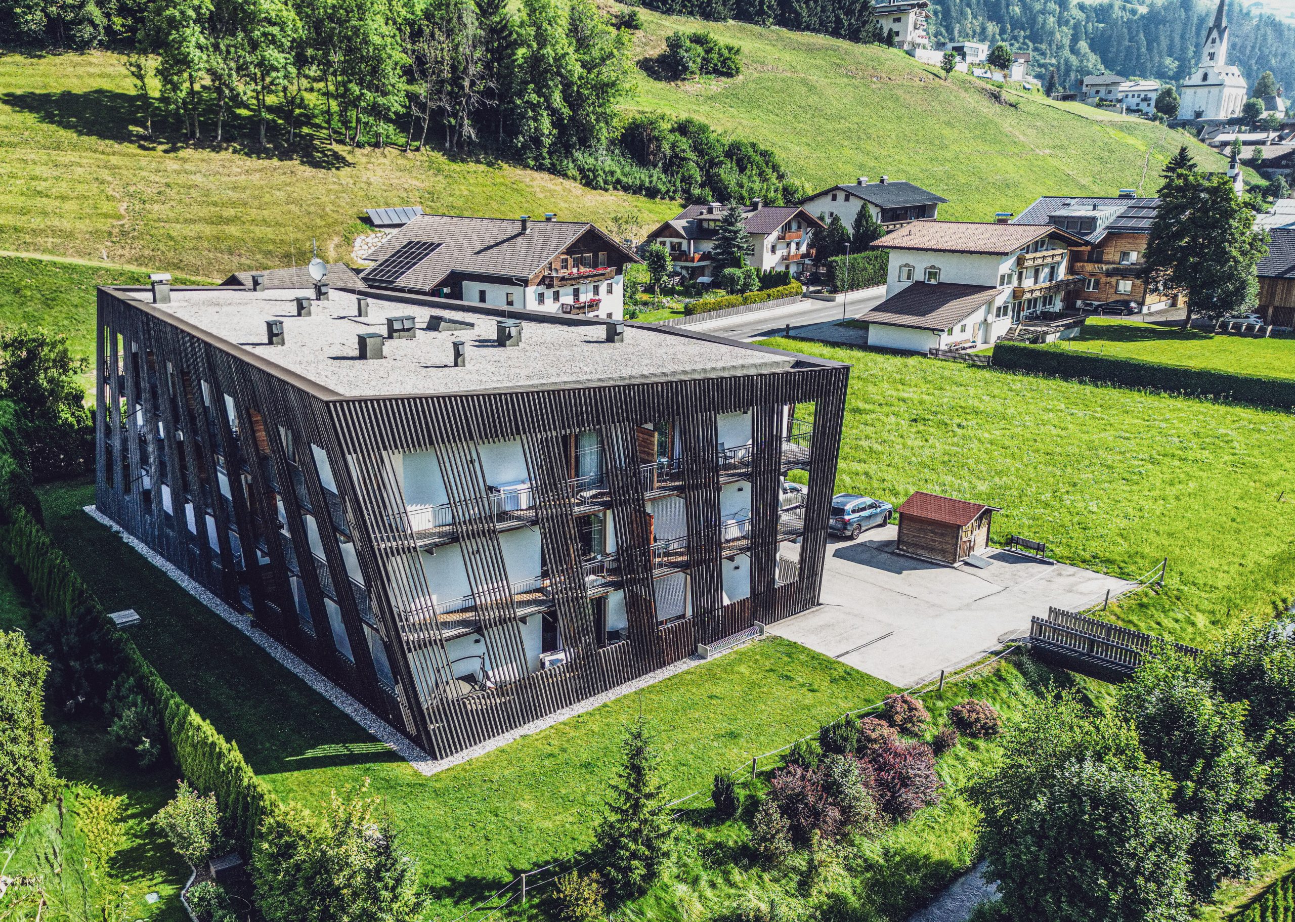 Modern alpine holiday apartments in Osttirol with mountain views, perfect for summer and winter stays.